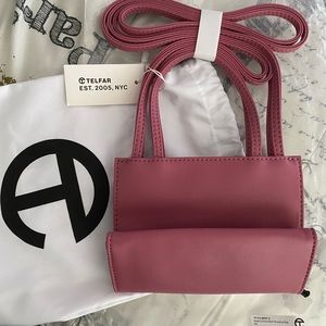 Pink Telfar bag tags are still on
